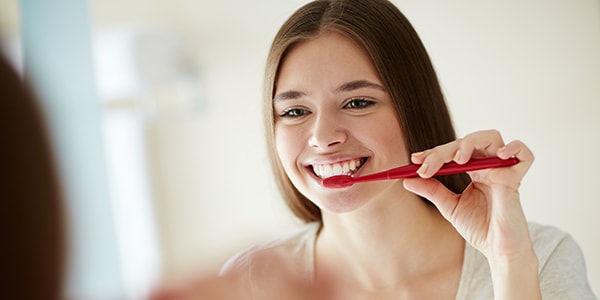 Change your brushing habits to get rid of tooth sensitivity